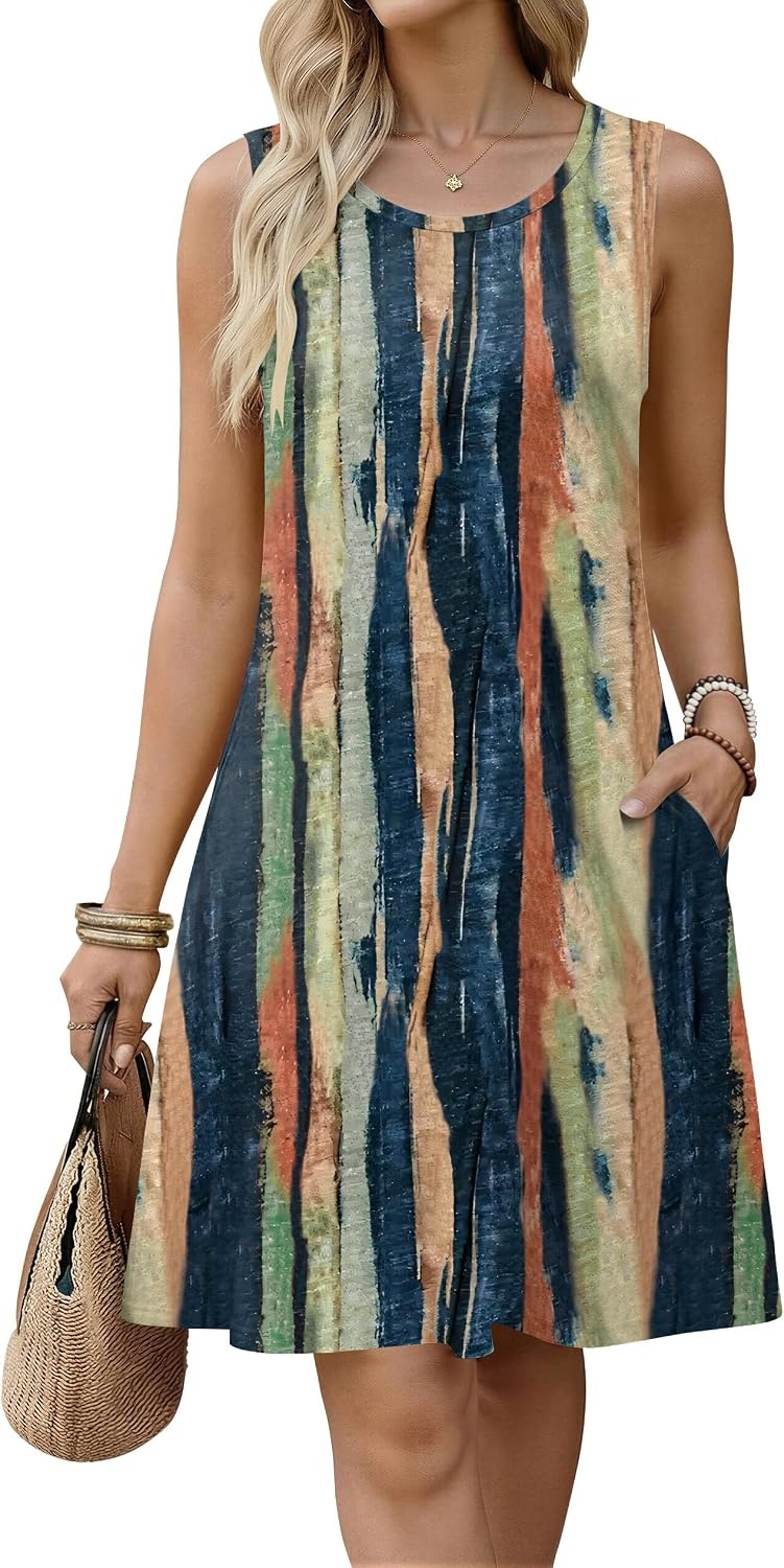 image:imageZeagoo Womens Summer Dress 2026 Sleeveless Casual ALine Tshirt Sundresses Dress With PocketFloral PrintCrewneckAline Flowy Swing Mini DressLoose Tank Tshirt DressFor Beach VocationStripe Print