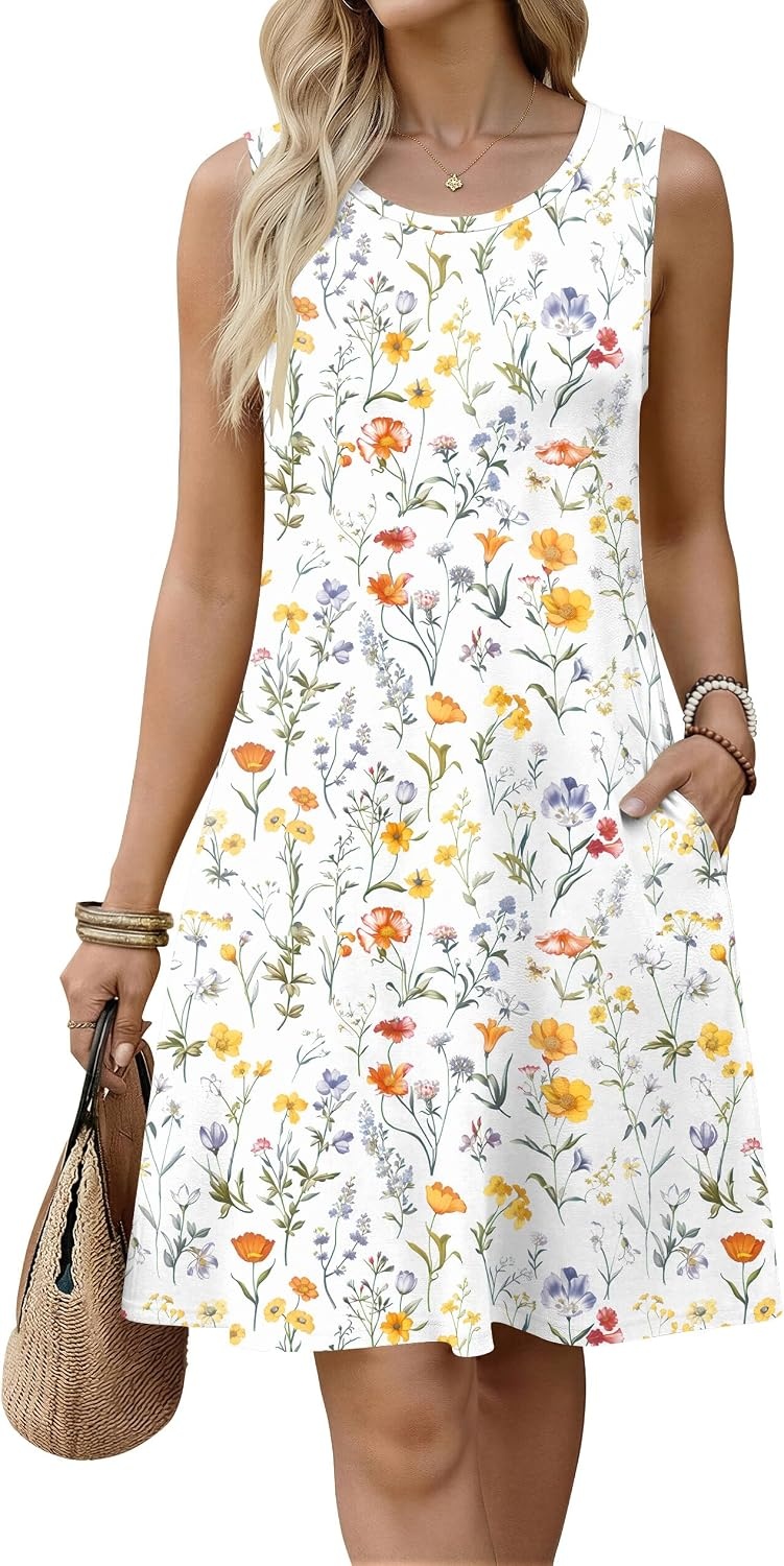 image:imageZeagoo Womens Summer Dress 2026 Sleeveless Casual ALine Tshirt Sundresses Dress With PocketFloral PrintCrewneckAline Flowy Swing Mini DressLoose Tank Tshirt DressFor Beach VocationWhite Floral