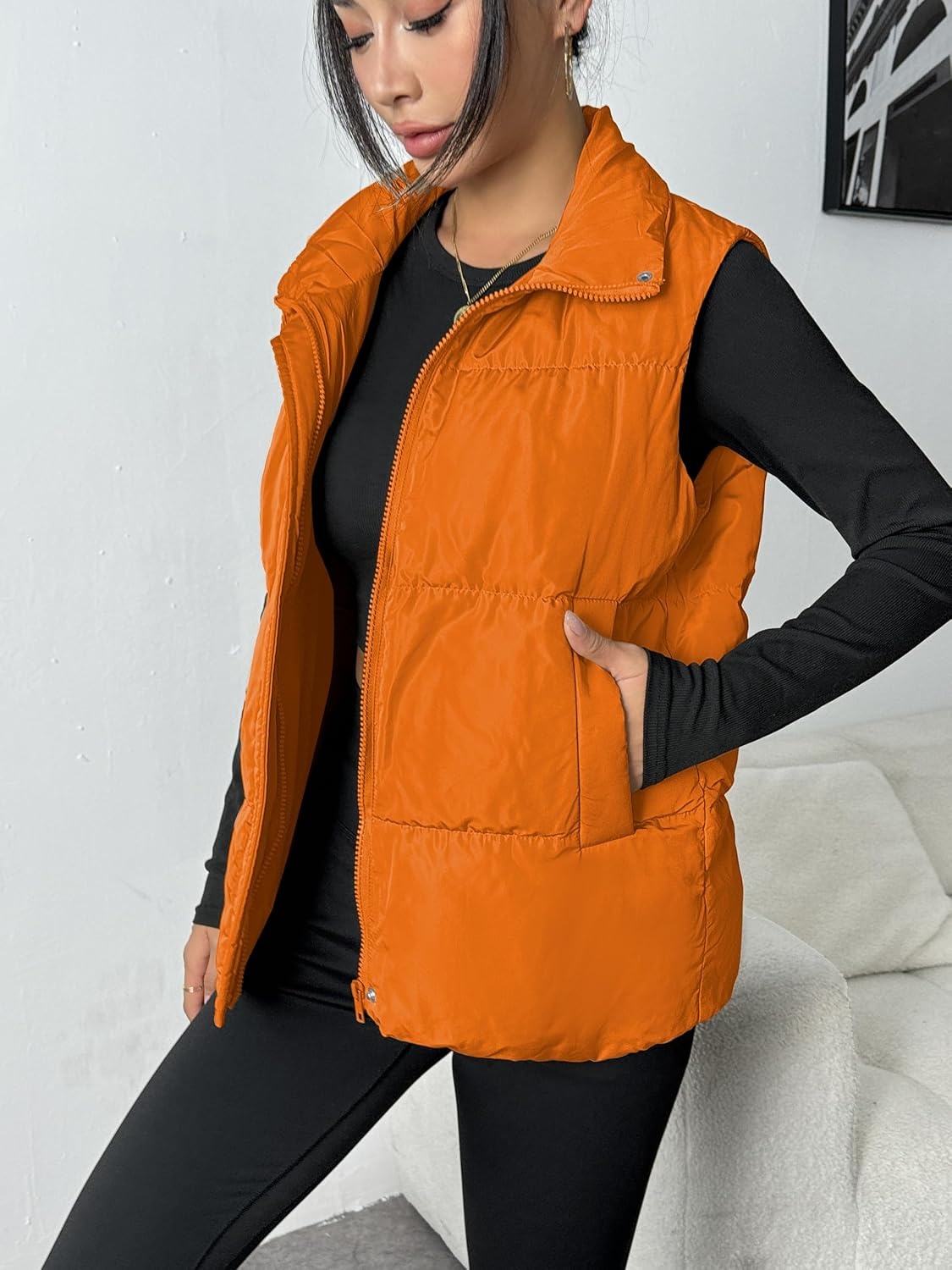 image:imageZeagoo Women Puffer Vest Lightweight Stand Collar Sleeveless Winter Warm Zip Up Padded Outerwear Jackets with Pockets SXXLOrange
