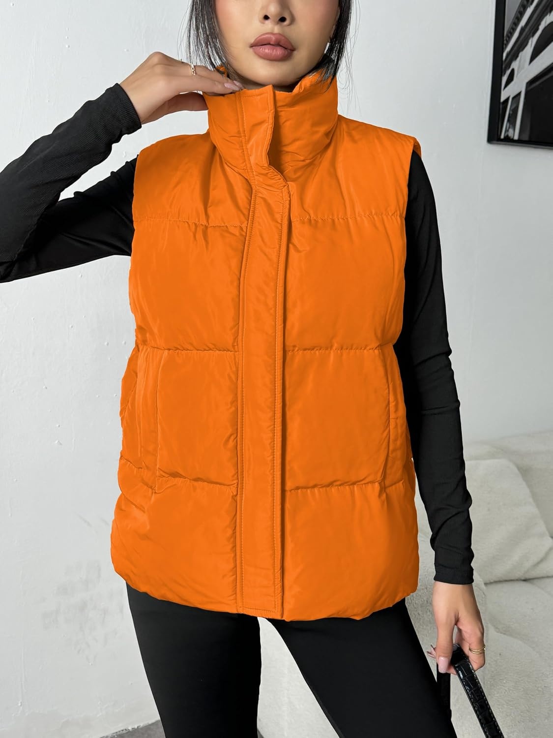 image:imageZeagoo Women Puffer Vest Lightweight Stand Collar Sleeveless Winter Warm Zip Up Padded Outerwear Jackets with Pockets SXXLOrange